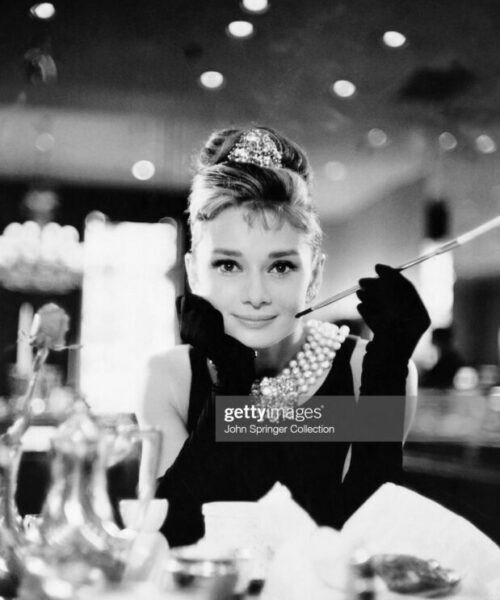Audrey Hepburn in evening gloves and tiara in Blake Edwards' Breakfast at Tiffany's. (Photo by �� John Springer Collection/CORBIS/Corbis via Getty Images)
